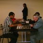 Chakroborty v Czuczman - They've only played a handful of moves, contrast the advanced stage of the junior game next to them!